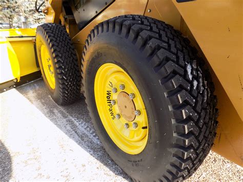 skid steer snow tures|SnowWolf WolfPaws Snow Tires.